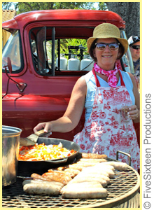 A woman at CC&C surrounded by food