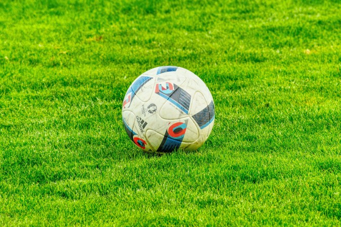 A soccer ball in the field.
